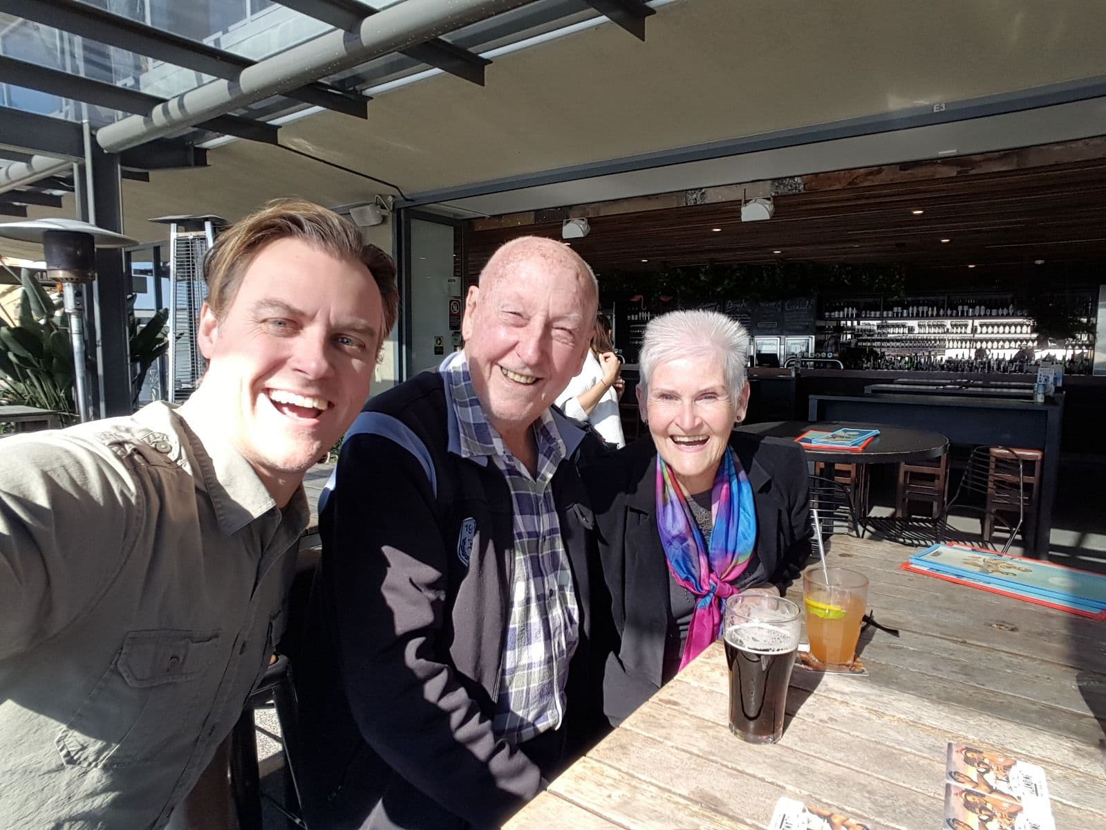Paul with his parents at a restaurant, shortly before the hike